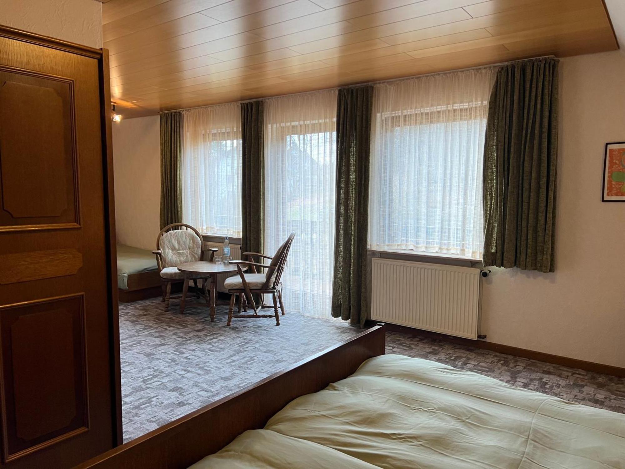 Dreibettzimmer mit Balkon